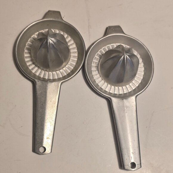 Pair of Vintage Metal Hand Citrus Juicers - Picture 1 of 3